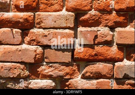 Brick Wall Collage Showing Various Shades and Textures in a Collection of Bricks Laid Evenly Stock Photo