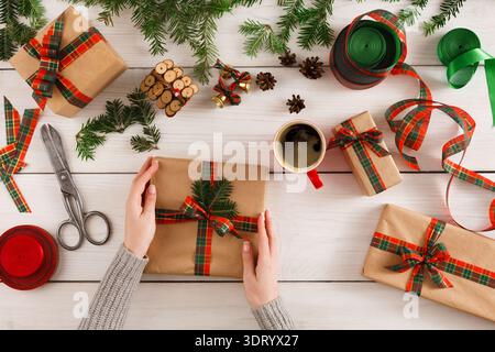 Gift Wrapping Session With Holiday Decorations and a Cozy Drink Stock Photo
