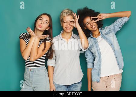 Group of Friends Create a Fun Collage With Different Poses and Expressions in a Photo Session Stock Photo