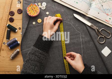 Creating a Sewing Project With Tools and Materials on a Workspace Table Stock Photo