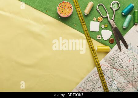 Collection of Sewing Tools and Materials for Crafting Displayed on a Workspace Stock Photo