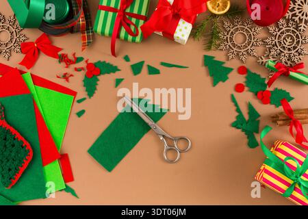 Creative Holiday Collage Setup With Craft Supplies and Decorations on a Table Stock Photo
