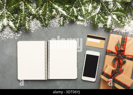 Holiday Collage Collection With Gifts, Notepad, Phone, and Decorations on a Table Stock Photo