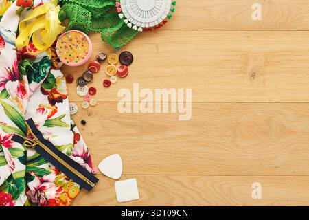 Collage of Sewing Materials on Wooden Surface Showcasing Vibrant Colors and Various Supplies Stock Photo