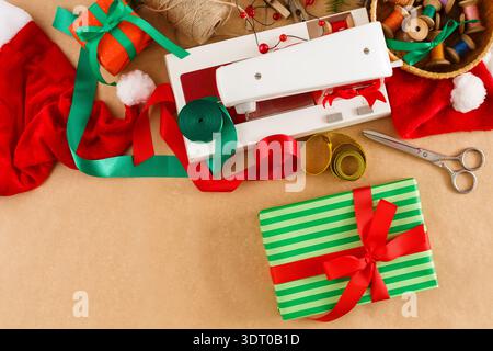 Holiday Gift Wrapping Collection With Tools and Decorations on a Table Stock Photo