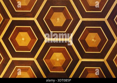 Collection of Hexagonal Wooden Patterns Arranged in a Mosaic Design on a Surface Stock Photo