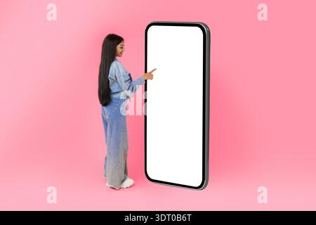 Woman using white empty smartphone screen panel Stock Photo