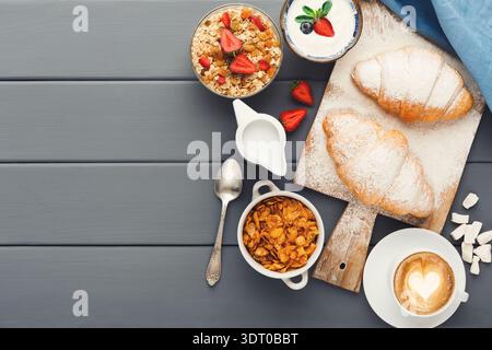Breakfast Collection on a Wooden Table With Different Dishes and Drinks for Morning Meals Stock Photo
