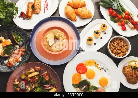 Collage of Various Dishes Served on Plates Showcasing Breakfast and Brunch Items in a Diverse Set Stock Photo