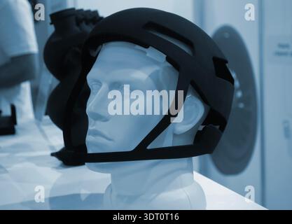 Protective helmet. Helmet printed on 3D printer from powder material. Model printed on 3D printer from melted polyamide powder. Multi Jet Fusion. Modern additive progressive 3D printing technology Stock Photo