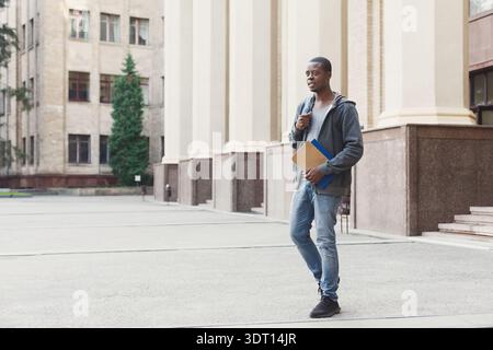 Collage of a Student Walking Near a Large Building With a Backpack in Hand and a Notebook Stock Photo