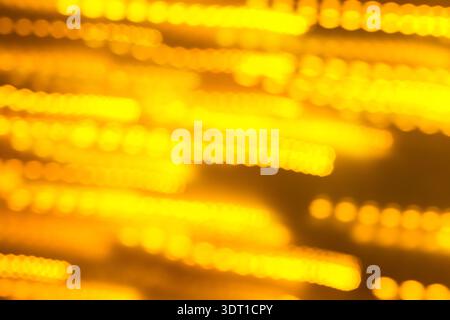 Collage of Glowing Yellow Lights in a Set of Blurred Lines Stock Photo
