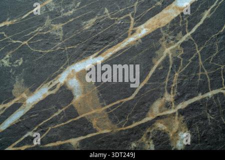 High-resolution image of a marble-imitated background featuring earthy tones and intricate vein patterns, ideal for design use in digital projects and Stock Photo