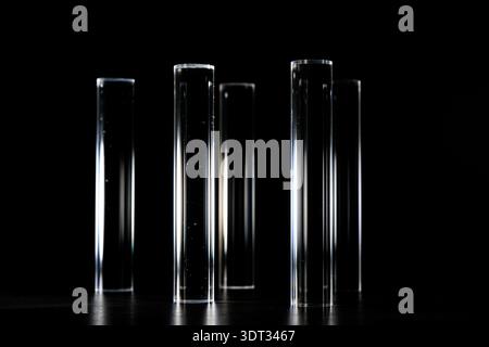 Clear Acyrlic rod against a black background Stock Photo