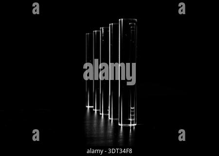 Clear Acyrlic rod against a black background Stock Photo