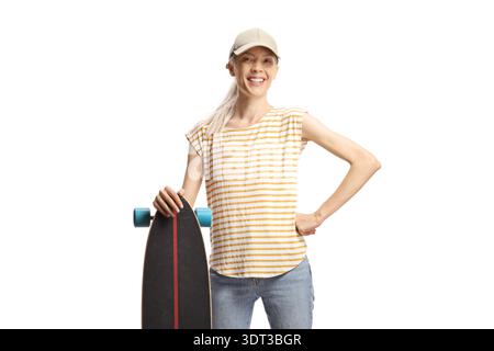 Woman posing with a longboard isolated on white background Stock Photo