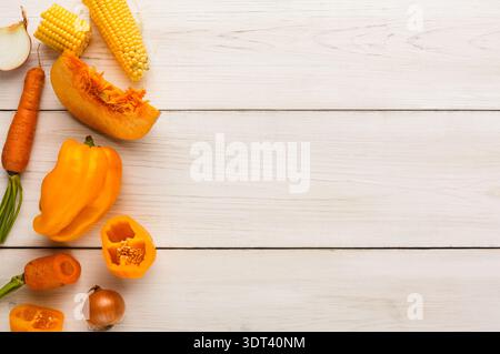 Assorted Vegetables in a Collage on a Wooden Table for a Healthy Meal Preparation Stock Photo
