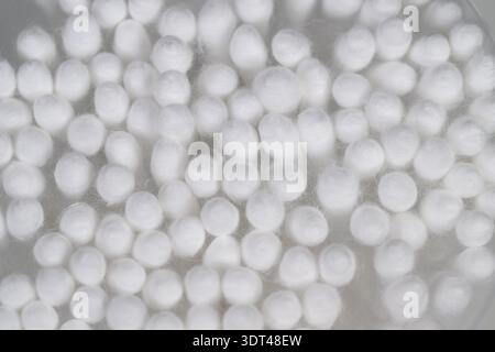 Abstract cotton swabs pattern uniform round tips creating repeating texture, bright white, usable as seamless background or textile print Stock Photo
