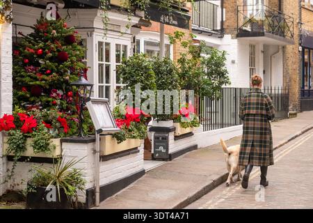 LONDON - DECEMBER 15, 2025: Perrins Lane – charming pedestrian street with cafes and shops in Hampstead Stock Photo