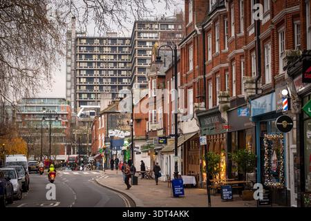 LONDON - DECEMBER 15, 2025: South End Road shops in Hampstead Heath houses urban village scene Stock Photo