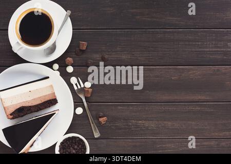 Mosaic of Desserts and Coffee on Wooden Table With Assorted Treats and Utensils Stock Photo