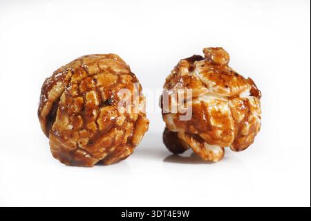 Chocolate popcorn on white background Stock Photo