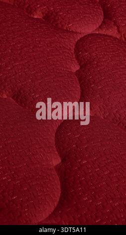Sumptuous Crimson Quilted Fabric Texture as an Elegant 8K Wallpaper and Vertical Background for Phone Screen With Copy Space Stock Photo