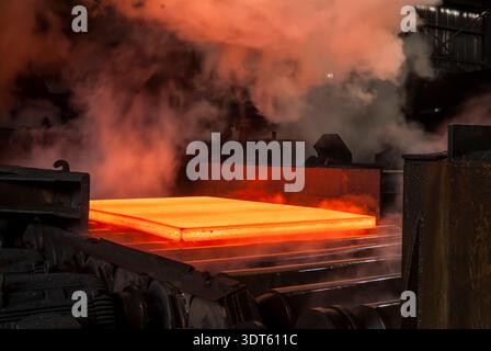 Red glowing rolled steel in steel mill, Pittsburgh, Pennsylvania, USA Stock Photo