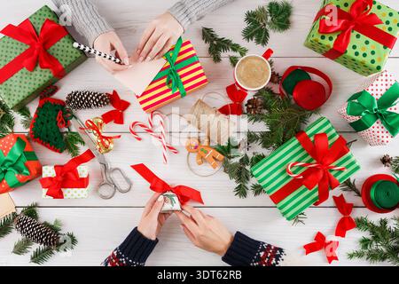Gift Wrapping Session in a Cozy Space With Festive Decorations and Holiday Cheer Stock Photo