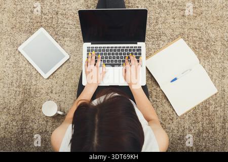 Collecting Ideas With Devices and Tools for Work and Study at Home on a Cozy Surface Stock Photo