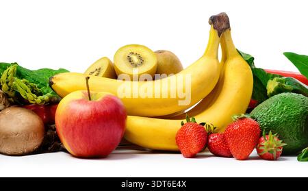 Arrangement of vegetables in appetizing colors in a row, representing a healthy lifestyle and fitness, studio shot isolated on white Stock Photo