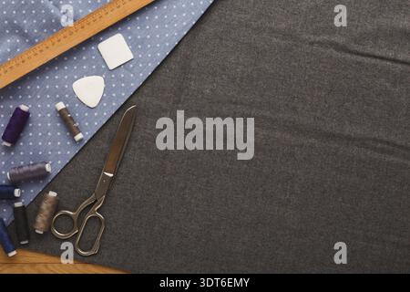Crafting Projects Using Fabric, Scissors, Thread, and Tools in a Creative Workspace Setup Stock Photo