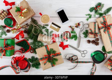 Creative Gift Wrapping Ideas for Holidays With Items and Tools on a Table Stock Photo