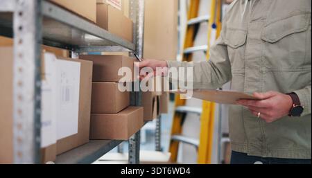 Box, hands and clipboard in warehouse for logistics, inventory management and stock checklist. Man, distributor and notes in storage facility for Stock Photo