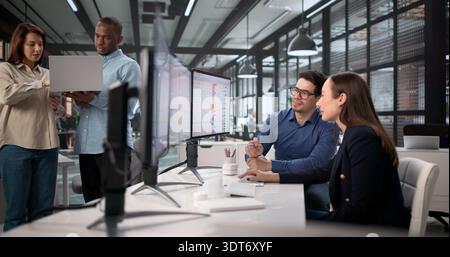 An African American Woman Is Using A Computer To Bill. Stock Photo