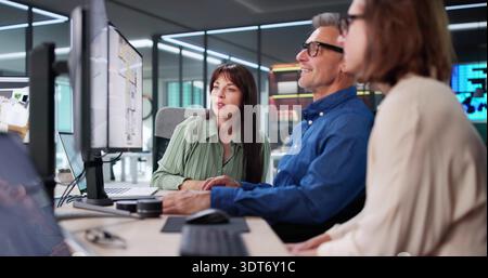 Senior Developer Measuring Land For Town Plot Using Computer Screen Stock Photo