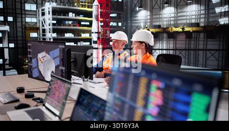 Engineer Uses SCADA Software To Control Rocket Construction In Lab. Stock Photo
