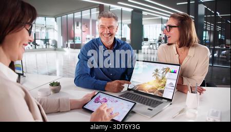 Creative Artist And Photographer Using Computer For Graphic Design Work Stock Photo