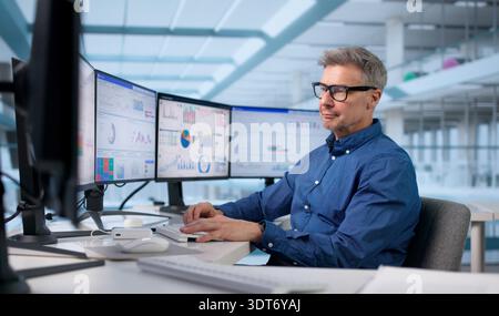 Executive Using Business Dashboard To Analyze Market Metrics Stock Photo