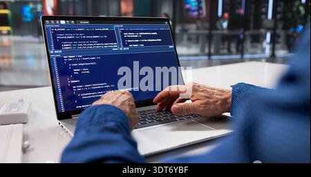 Male Programmer Codes Secure Software For Online Data Protection Project Stock Photo