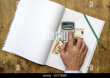 Man doing his accounting, financial adviser working Stock Photo