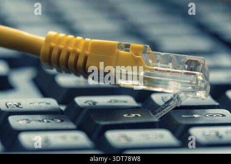 Yellow internet switch on computer keyboard, close-up Stock Photo