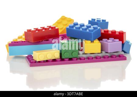 Toys background with colorful plastic building blocks isolated on white Stock Photo