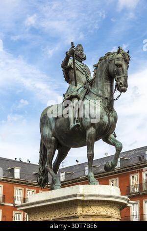 Statue of Philip III at Mayor plaza in Madrid in a beautiful summer day, Spain Stock Photo