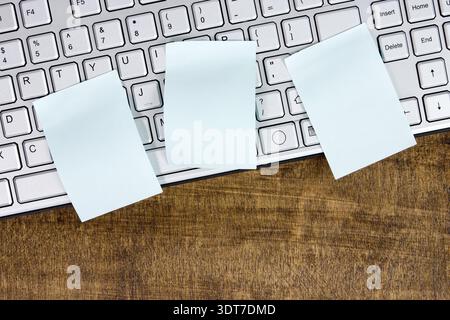 Memo on silver computer keyboard. Can be used for your text Stock Photo