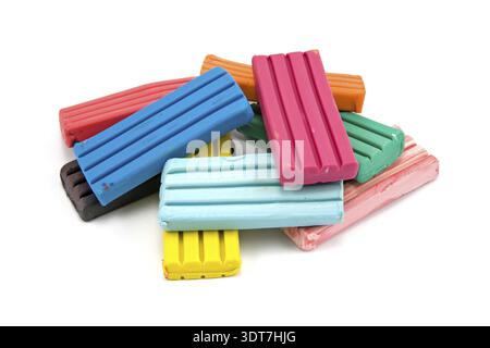 Colorful children's plasticine bricks on a white background Stock Photo