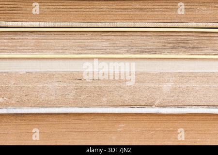 Side view of stacked books, extreme close up Stock Photo