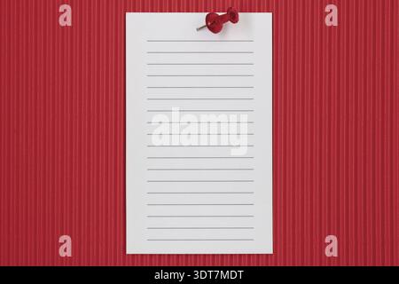 White lined paper pinned on red background for memo, notice or to do list Stock Photo