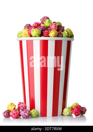 Caramelized fruit popcorn in red and white striped paper cup isolated on white Stock Photo