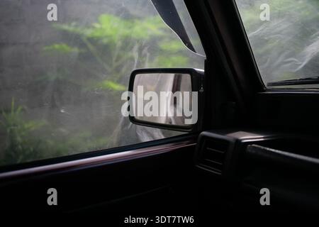 side mirror car view from cabin Stock Photo
